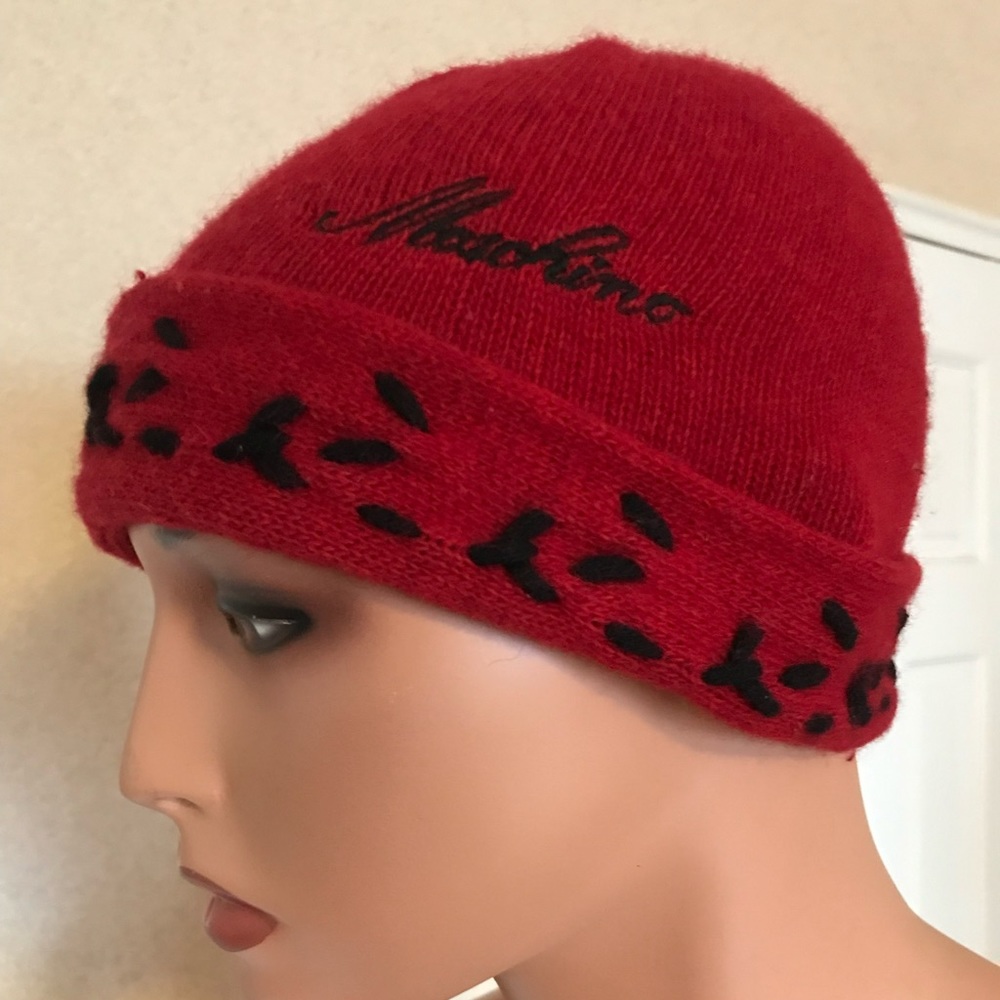 Moschino red head either black detailing. In like new condition.